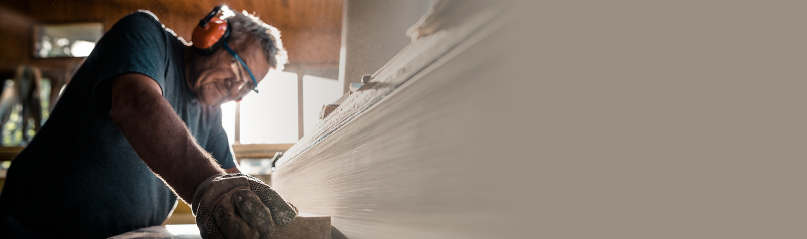 a man working with wood smarter and safer with hearing protection